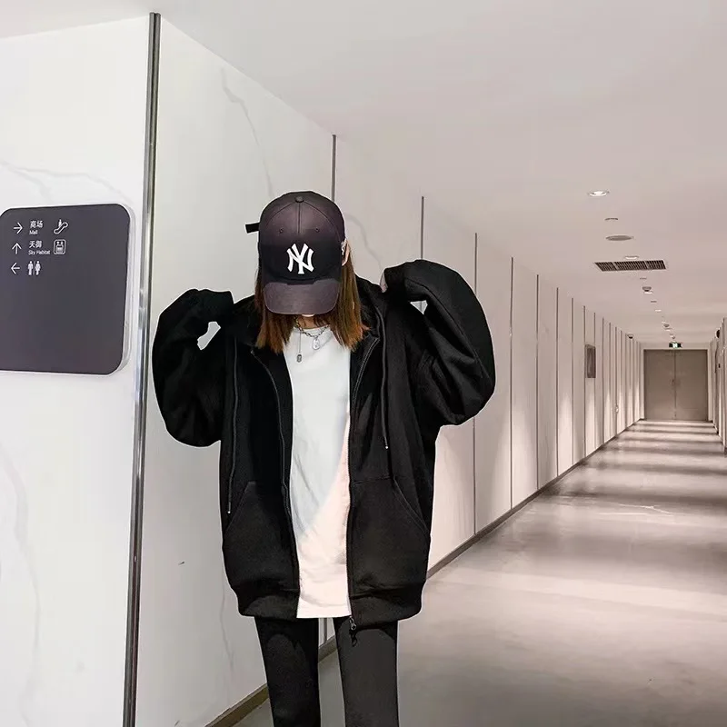 حجم كبير فضفاض سستة هوديس أسود بلون مقنعين بلوزات الموضة الكورية كم طويل جيوب الرباط CYXX086