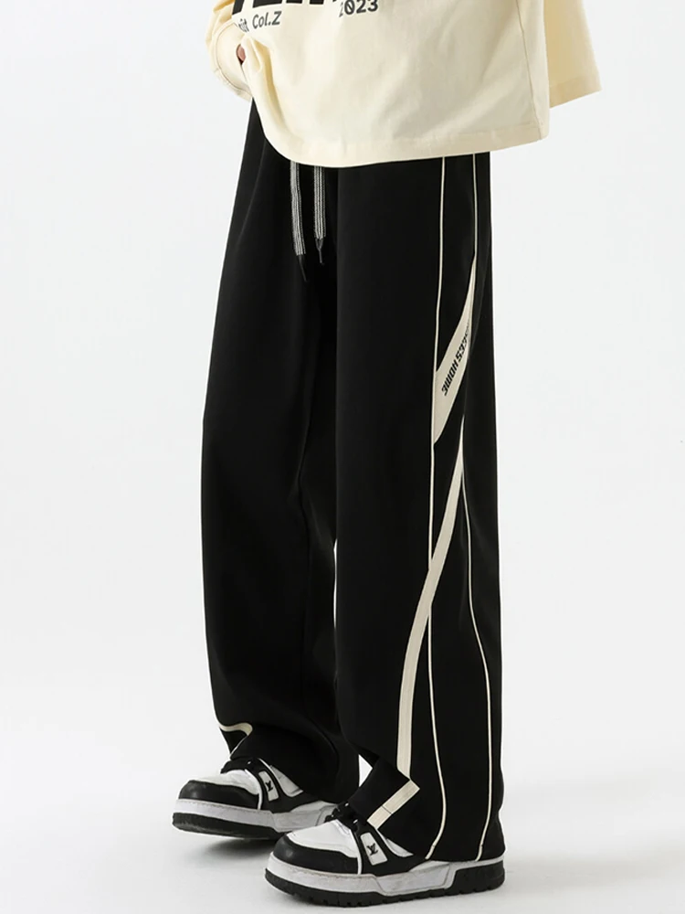 

Мужские спортивные брюки в американском стиле с полосками, летние, трендовые, свободного кроя, прямые, с пэчворком, повседневные, широкие, в пол