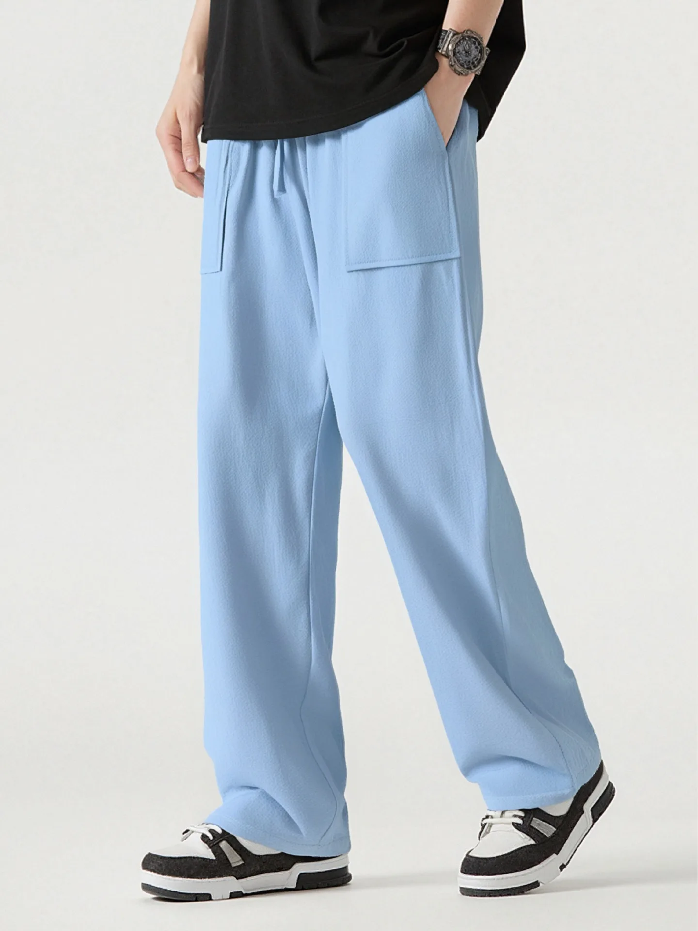 

Новые модные и повседневные однотонные длинные брюки из веревки, которые хорошо продаются весной и осенью для мужчин.