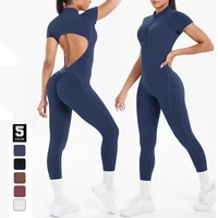 Mono Sexy sin espalda ceñido al cuerpo para mujer, mono de baile y Fitness con realce y cojín en el pecho, traje de salto deportivo para Yoga