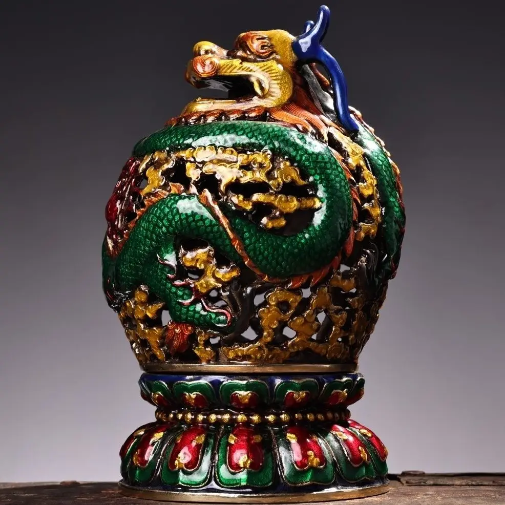 A well preserved antique antique bronze cloisonn é pan dragon incense burner with enamel color painting