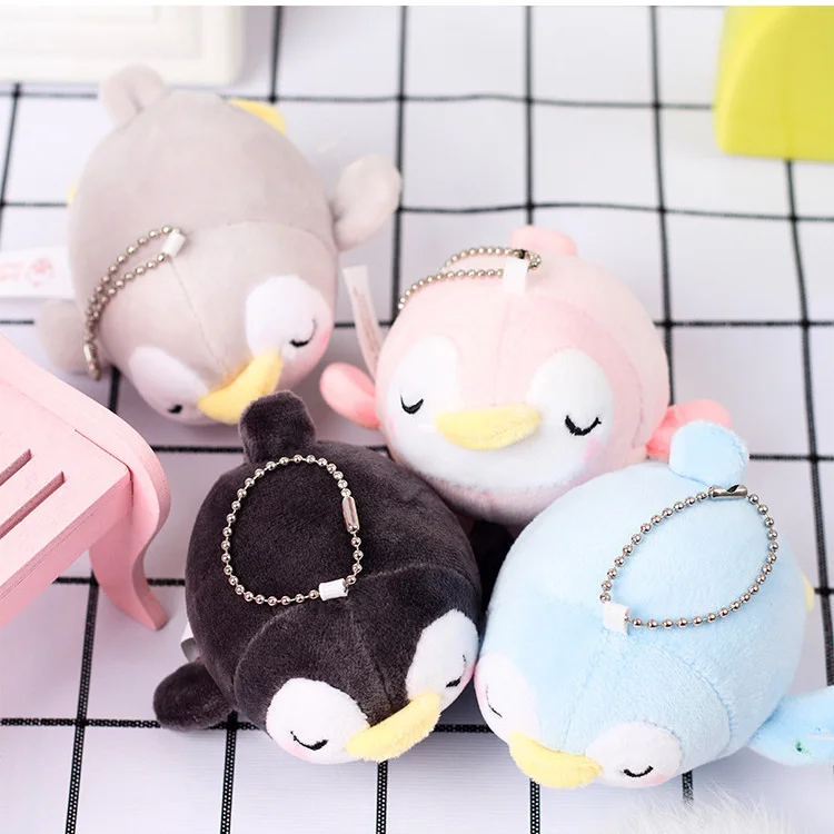 オーシャンパークのかわいい眠っているペンギンのぬいぐるみ、北極ペンギンの人形、バックパックペンダント、キーホルダー、学生のバックパックの装飾ペンダント