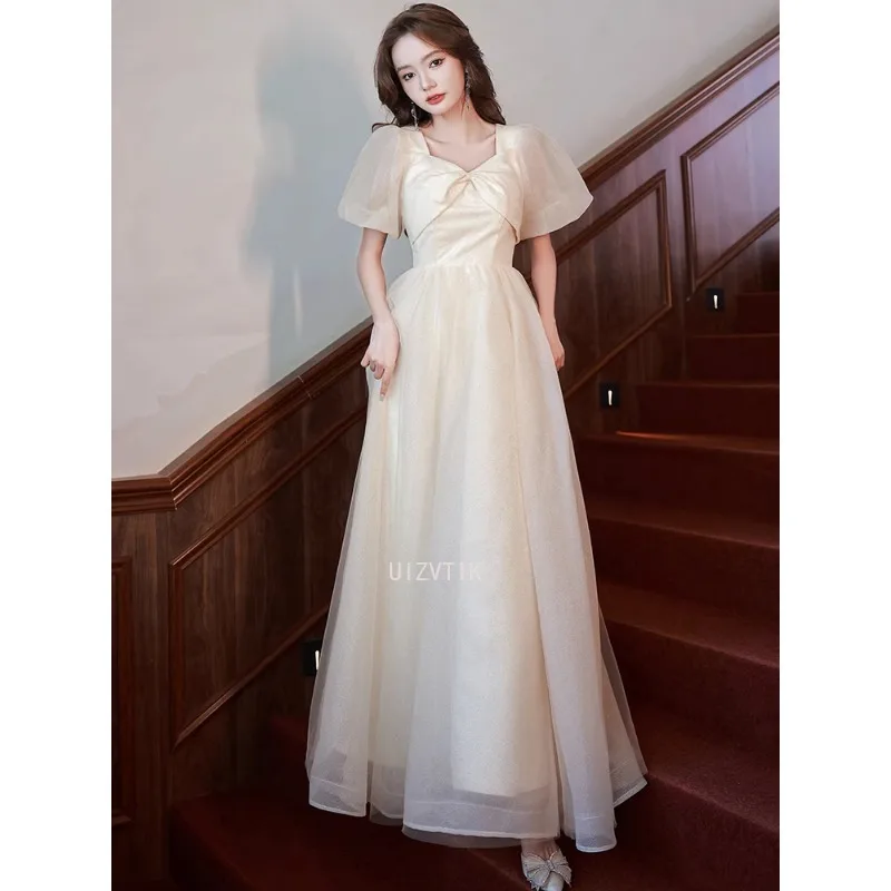 فستان الحفلات المسائية بلون الشمبانيا أنيق بفيونكة قابلة للطي وياقة مربعة فساتين مناسبة رسمية بسيطة بلينغ بلينغ فساتين زفاف طويلة