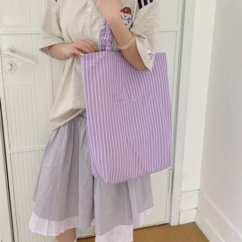

Korean StyleinsCute striped lightweight bag for women, new student versatile shoulder bag, large-capacity stylish tote bag