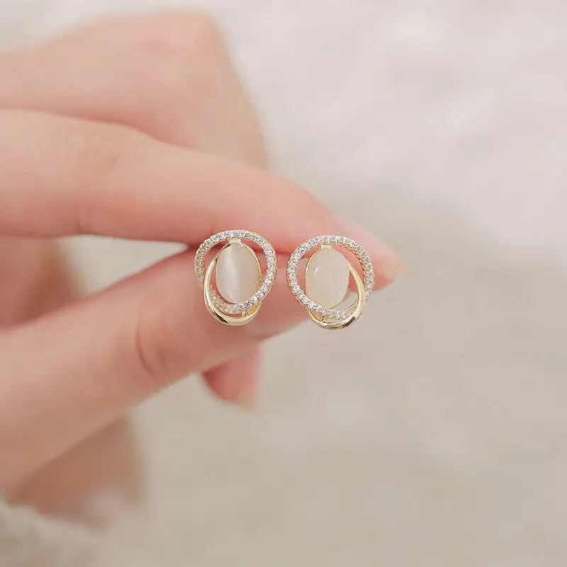 Trendy Small Oval Opal Stud Earrings for Women Rhinestones Crystal Twist Metal Hollow Irregular Geometry Earrings Jewelry