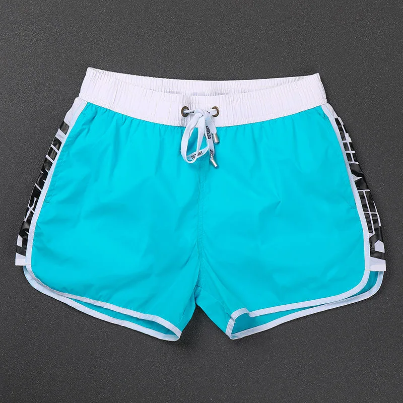 

Легкие спортивные повседневные мужские летние новые свободные пляжные брюки Qui Dry для бега, универсальная футболка длиной четверти