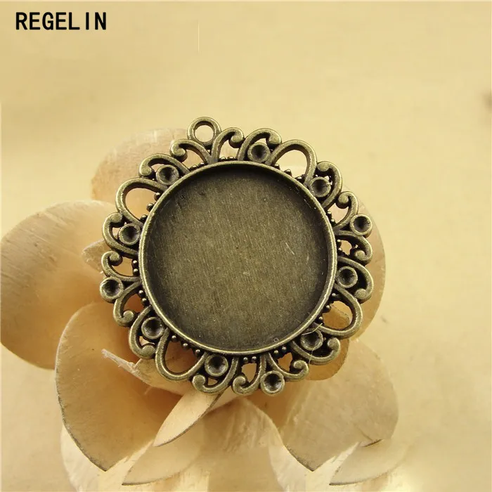 REGELIN Antique Bronze cork base Alloy Tray round filigree cameo cabochon 10pcs/lot Inner Size 25mm Jewelry Making Accessories