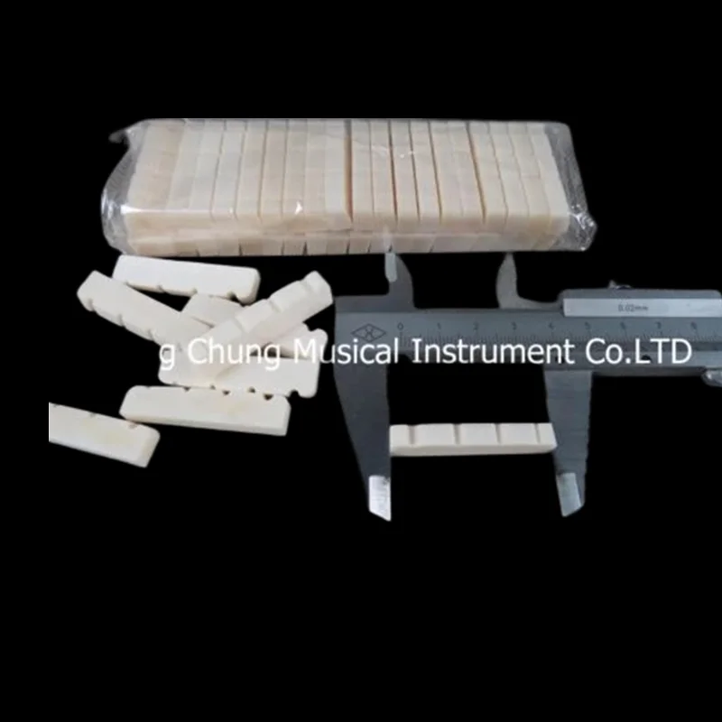 

20pieces 4-strings Bass Guitar Nut DJ-27