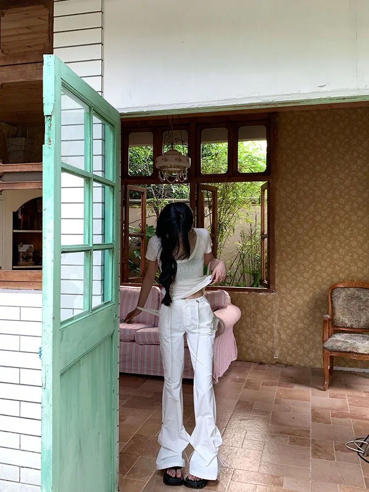 

Брюки женские One a Gua 2025, новые летние, в стиле ретро, с эффектом «пикантной девушки», белые, зауженные, с легким расклешением, повседневные, удобные, дышащие, модные...