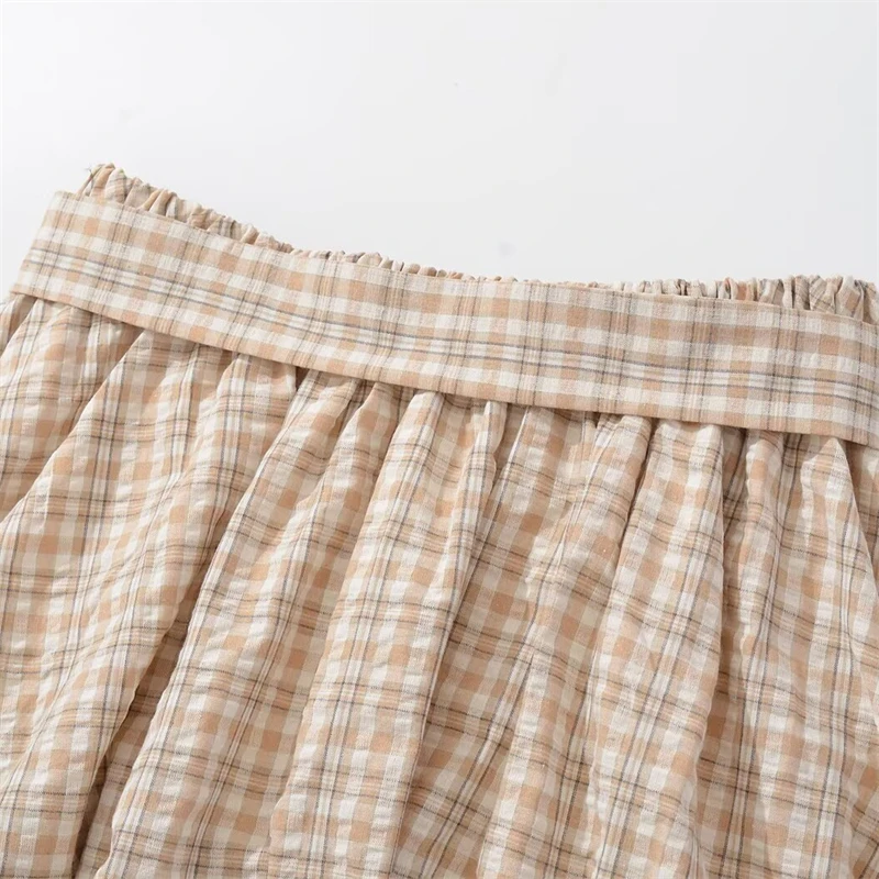 KEYANKETIAN 2025 Letnia nowa damska mini spódniczka w kratę w stylu preppy z kokardką i elastyczną talią A Line Puffy Skirt Fashion Pantskirt