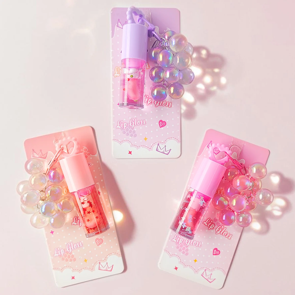 ما هو زيت الشفاه السحري الحقيقي؟ تجربة عملية وتحليل دقيق لمنتج Three Color Random Grape Pendant Lip Oil
