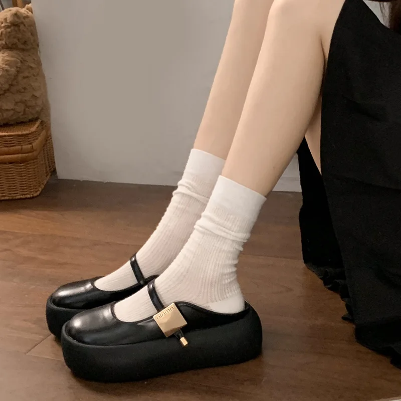 

Black heightened bag head thick-soled slippers for women's summer wear 2024 new non-slip versatile skirt Mary Jane half-tow