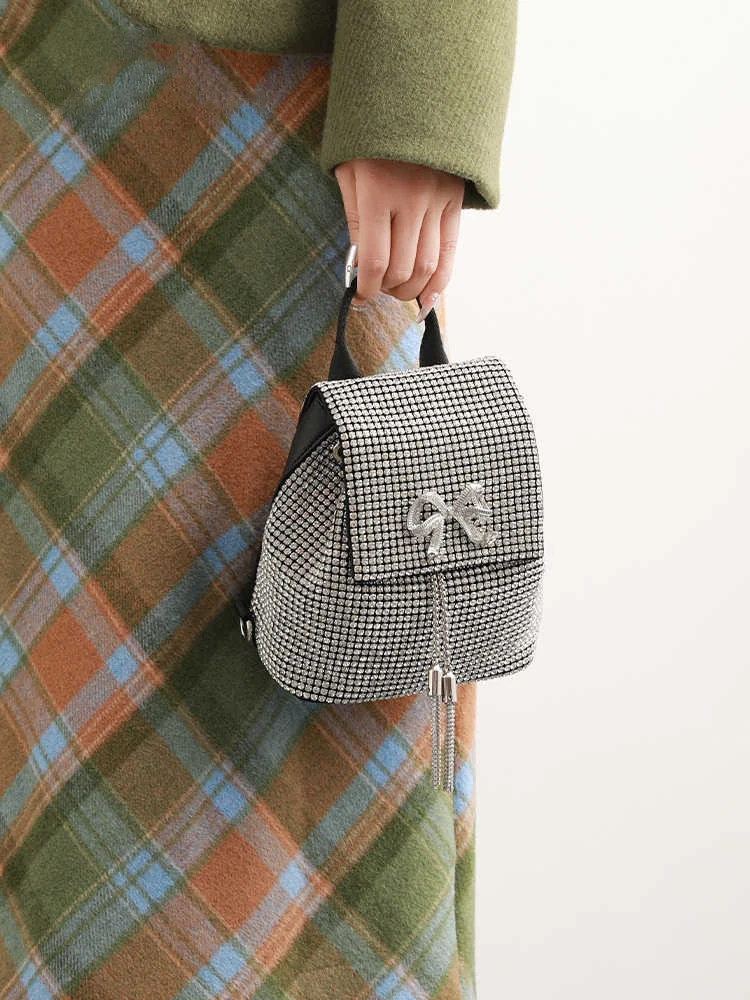 حقيبة ظهر ماسية فاخرة مصممة للنساء حقائب مدرسية جديدة متعددة الاستخدامات للطلاب الجامعيين حقائب دلو أنيقة على شكل فيونكة