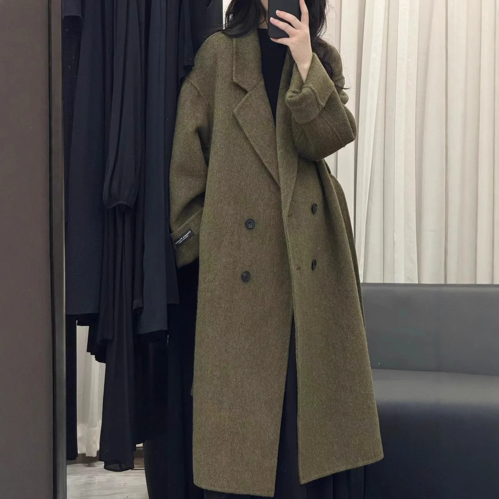2026 Autumn and Winter New Long Woolen Coat Temperament Women's Korean Long Sleeved Loose High-end Woolen Coat Commuting Style