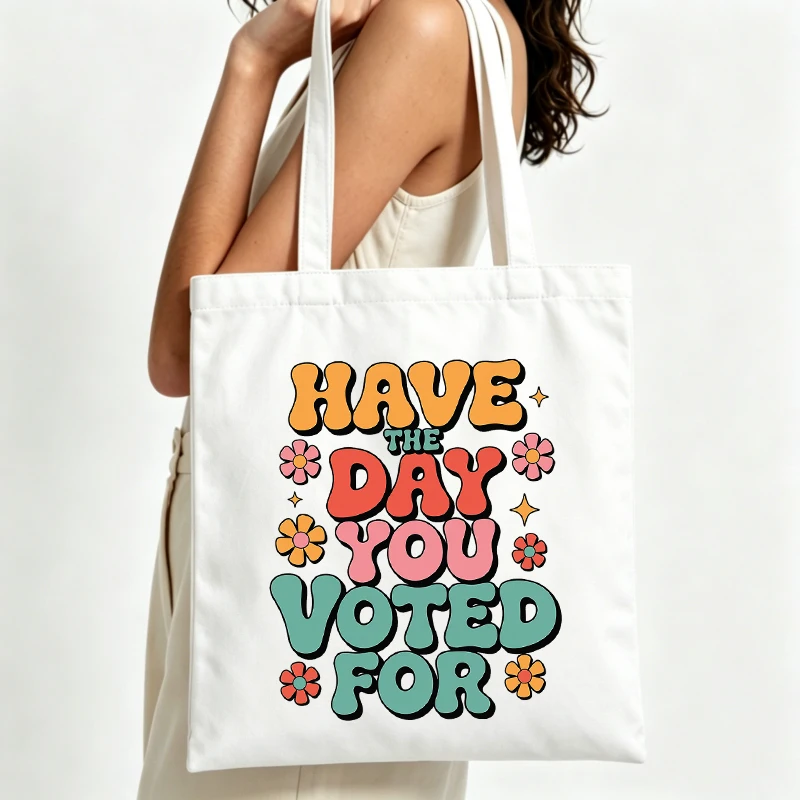 Women's slogan-style canvas tote bag with retro floral print, ideal for casual daily use and summer outings