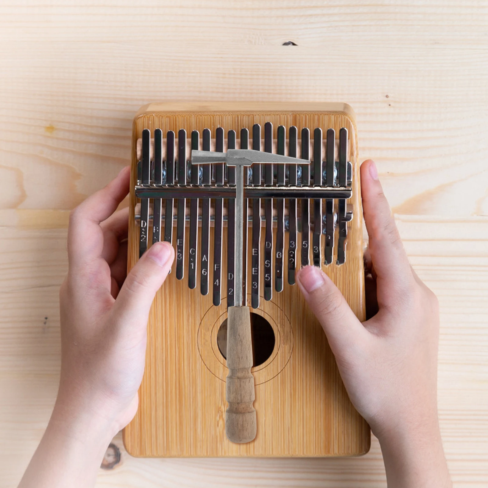 

Tuning Hammer Finger Thumb Piano Electronic Kalimba Wooden Handle Guitar Repair Tool