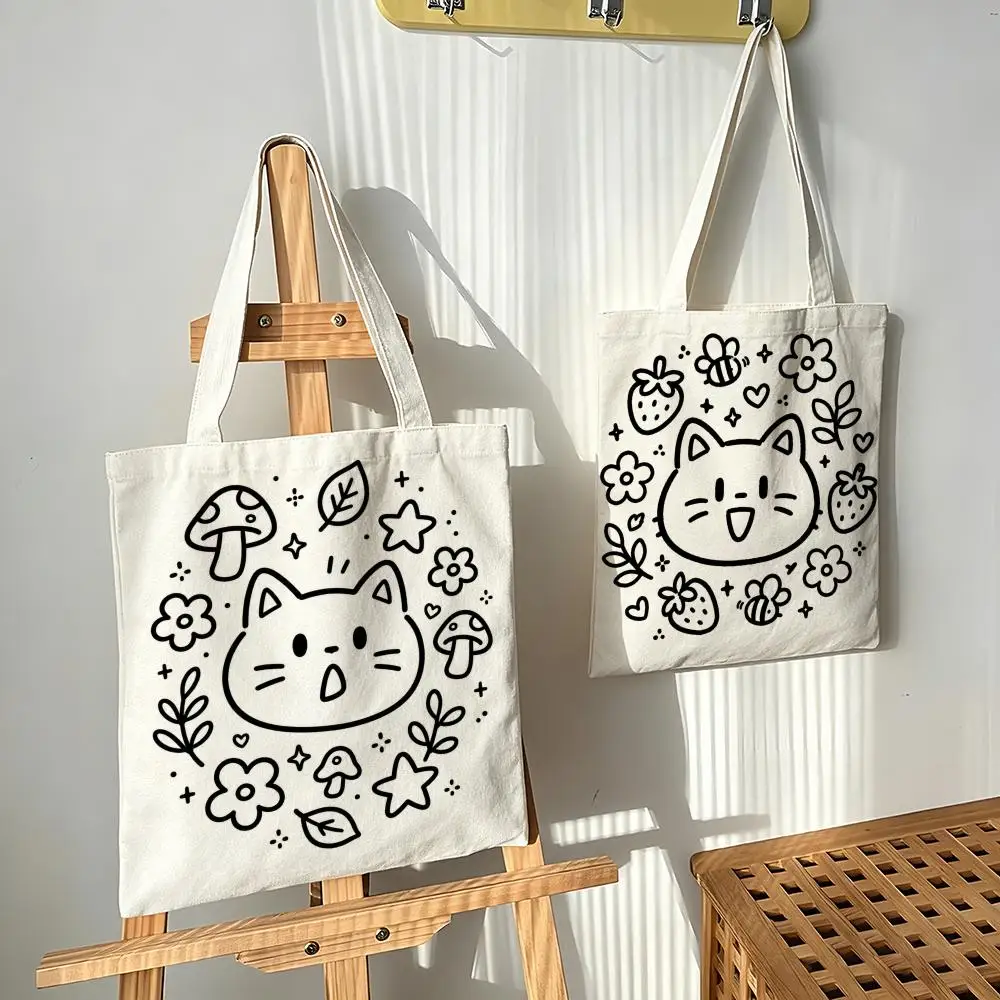 Simple drawing of a kitten Storage Bags Canvas bags are suitable for going to class, shopping, gifts, and commuting