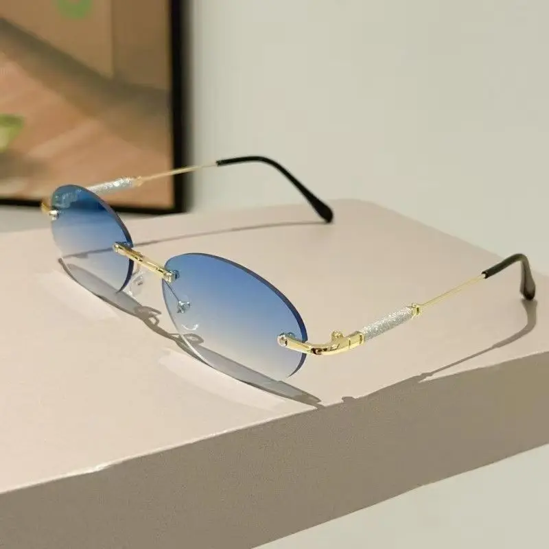 

Новые овальные солнцезащитные очки без оправы в маленькой оправе для женщин, элитные брендовые очки, винтажные женские круглые солнцезащитные очки, модные оттенки