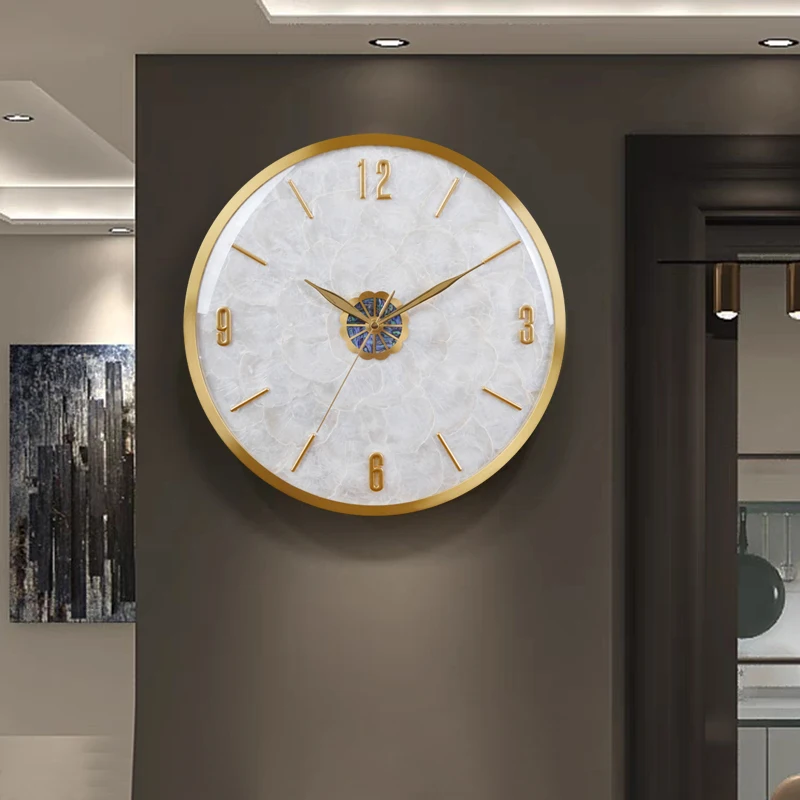 Modern minimalist brass wall clock quiet luxury shell home fashion creative clocks.