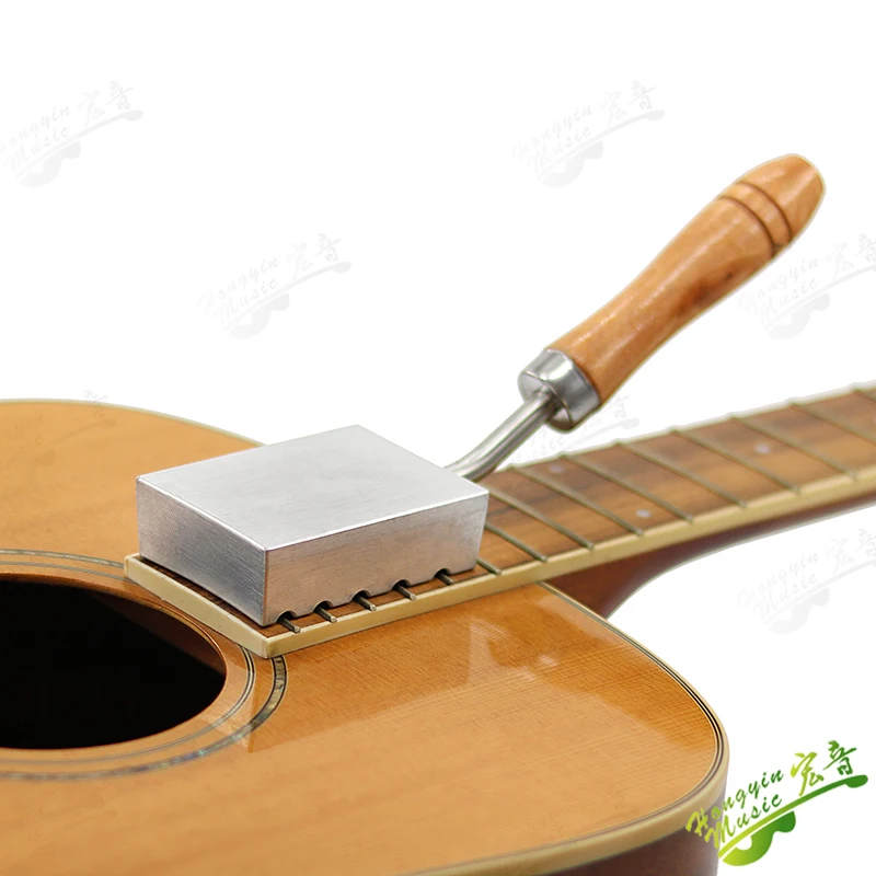 disassemble the guitar fretboard, remove the frets, remove th-e bridge, remov-e th-e bridge, and remov-e t-he soldering iron tip