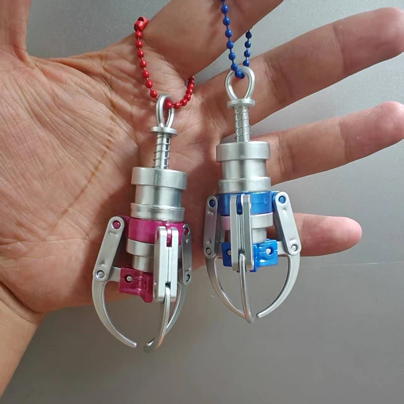 NEW Creative Press Type Catch Dolls Claw Model Keychain Mini Simulation Claw Machine Decompression Keychain Backpack Pendant