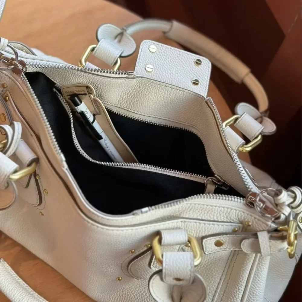 Nicho de cuero de primera calidad, estilo Medieval clásico, nicho Retro, moda versátil, bolso con cerradura antigua, bolso de hombro portátil para axila, tendencia genial