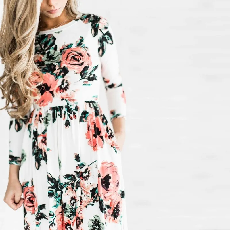 Luźna, długa, codzienna spódnica maxi damska z okrągłym dekoltem, kwiatowym nadrukiem, bawełniana, z elastyczną talią, długa, letnia.