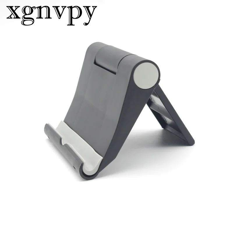 xgnvpy    Universal Tablet & Phone Holder - Portable, Adjustable iPad Stand, Flexible Support for Any Device