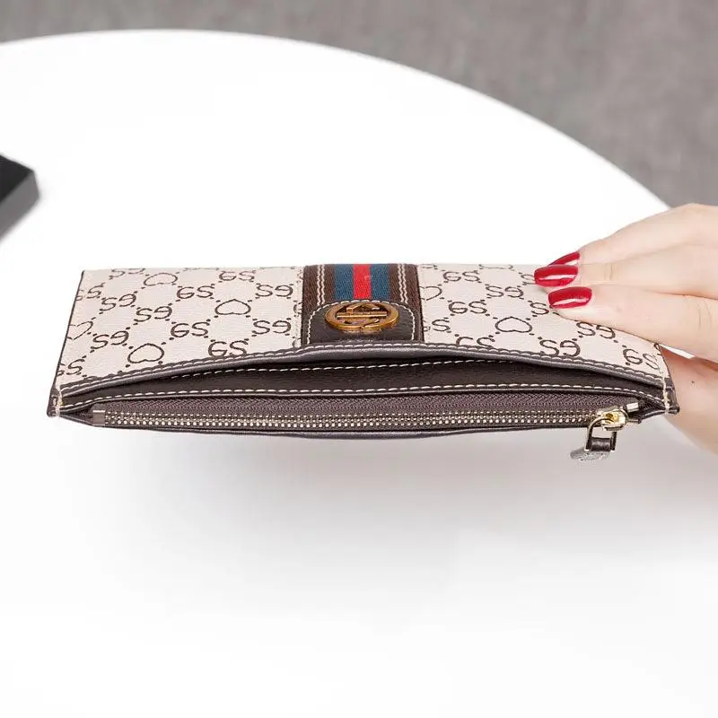 hong-kong-2026-nouvelle-collection-portefeuille-ultra-mince-a-main-pour-femme-long-portefeuille-zippe-en-cuir-veritable-multi-cartes