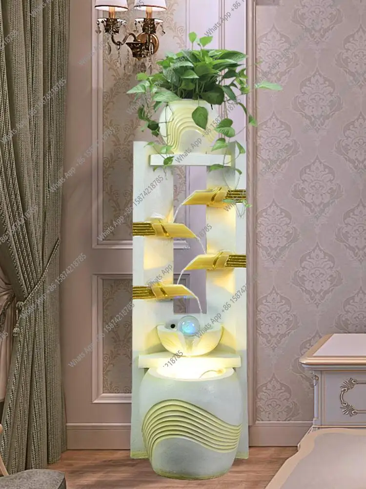 

Flowing water fountain TV cabinet next to the decorative beauty club opening gift feng shui lucky landing ornament
