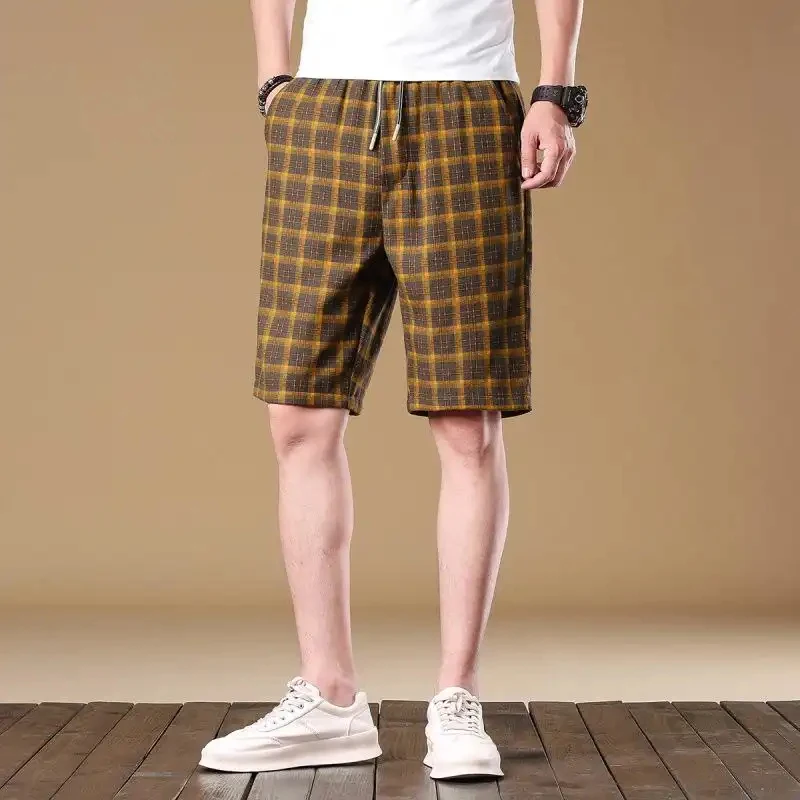 Casual summer plaid shorts with drawstring for men, simple loose and versatile American retro style trousers for men.