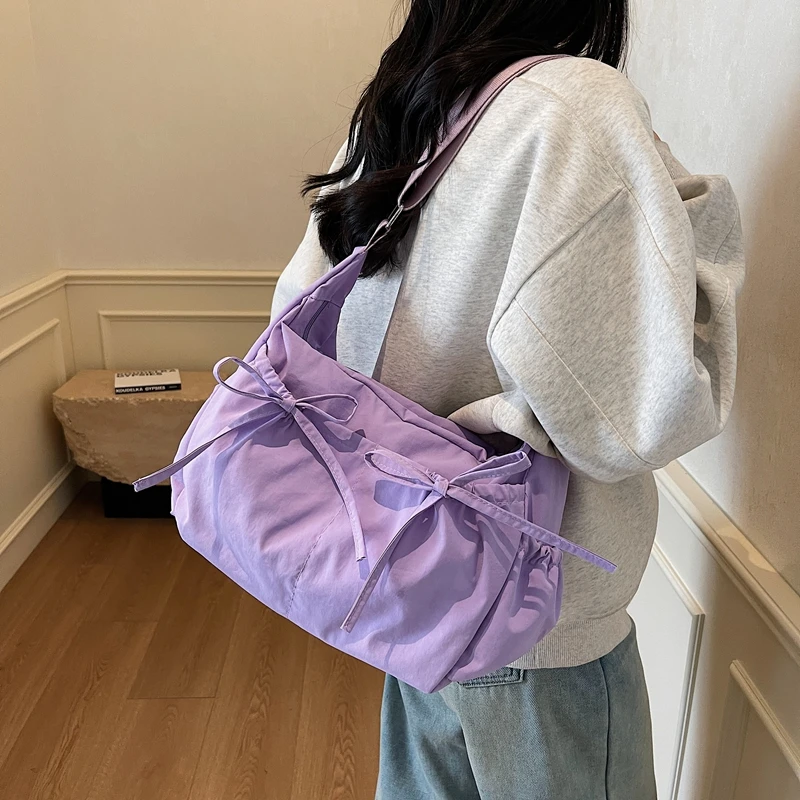 

Nylon Bow Soft Simple Crossbody Bags Sewing Commuting Ladies Bags 2025 Fashion Solid Color Design Zipper Women's Handbags