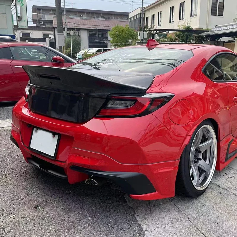

Для Toyota GR86 и Subaru BRZ: верхняя крышка багажника из карбона, комплект аксессуаров для кузова автомобиля.