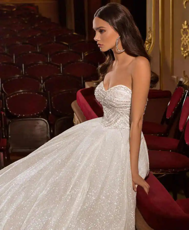 فستان زفاف فاخر مزين بالترتر بدون حمالات بطول الأرض فستان زفاف الأميرة العروس مخصص فيستدو دي نوفيا