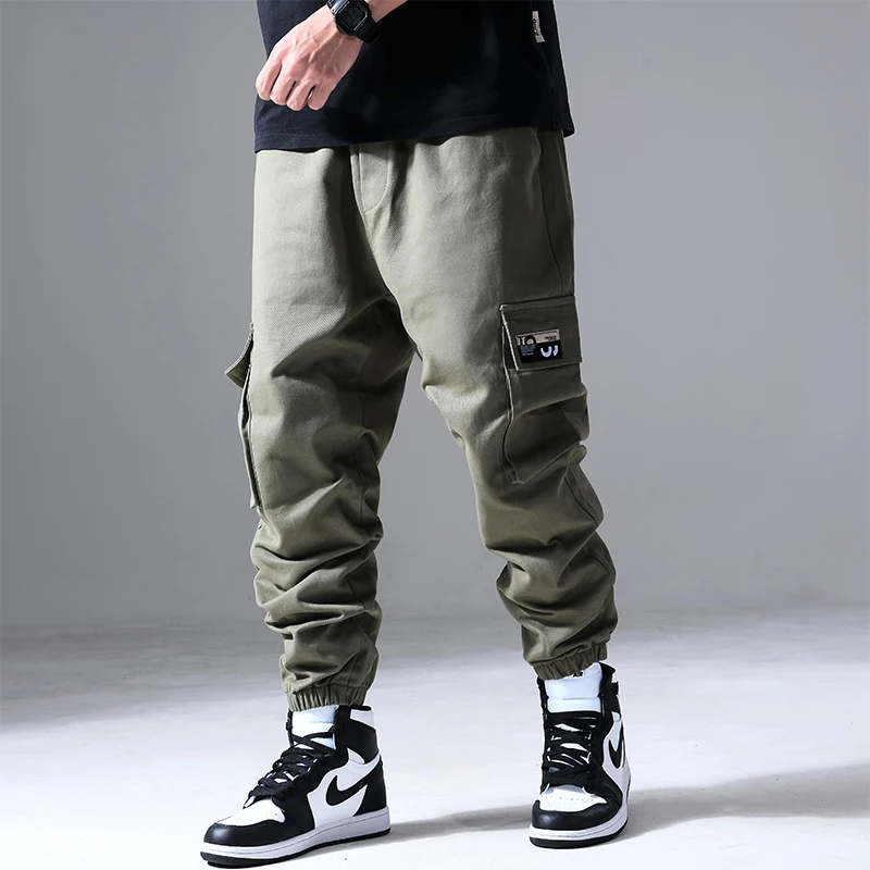 Moda męska Hip Hop Cargo spodnie z wieloma kieszeniami modna odzież uliczna solidne spodnie dresowe Casual bawełniane biegacze męskie — zdjęcie 5