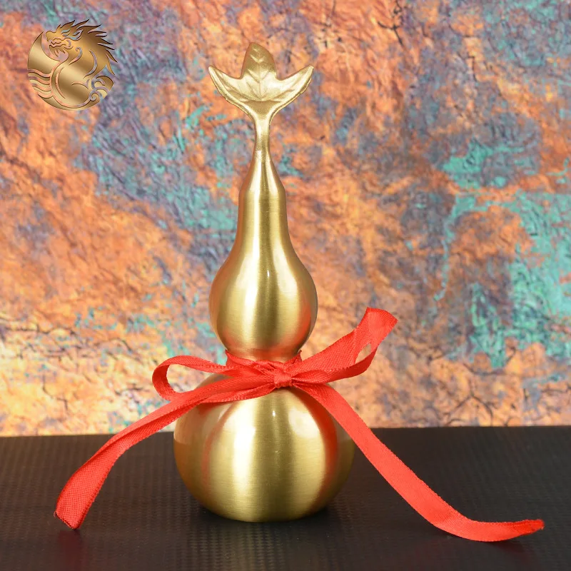 All-brass plain leaf gourd with an opening, featuring a bagua pattern, used as an entryway decoration or ornament