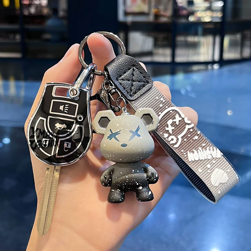 

Suitable for the New Xuan Yi Key Protection Cover, New Qi Da Sunshine Ma Chi, Nissan Straight Plate Car Buckle, Men and Women