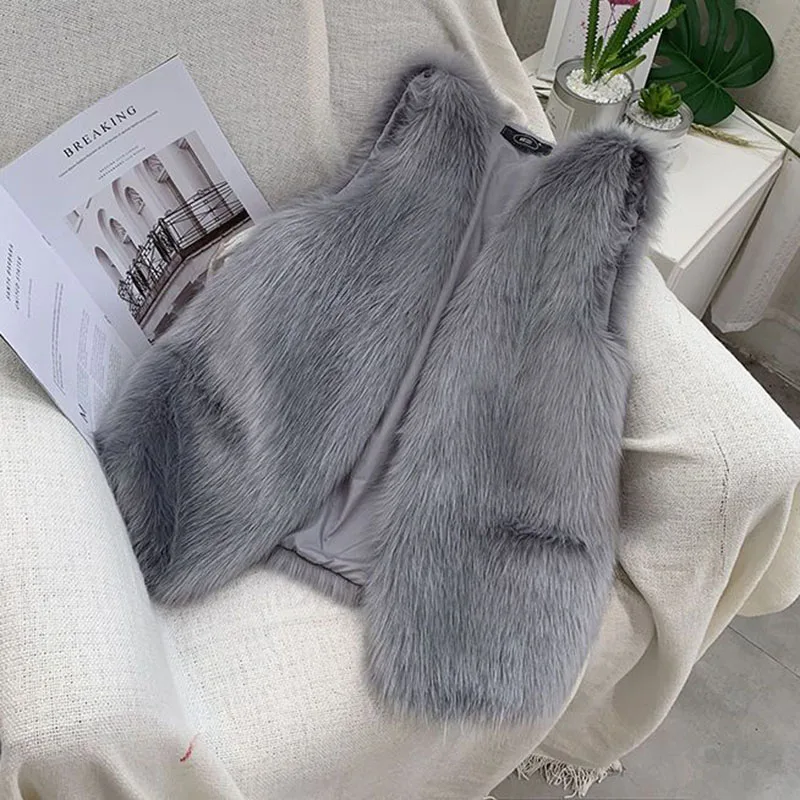 Nueva moda mujer chaleco de piel sintética abrigo Otoño Invierno chalecos cálidos versátil Casual suelto chaleco de piel sintética mujer camiseta sin mangas chaqueta