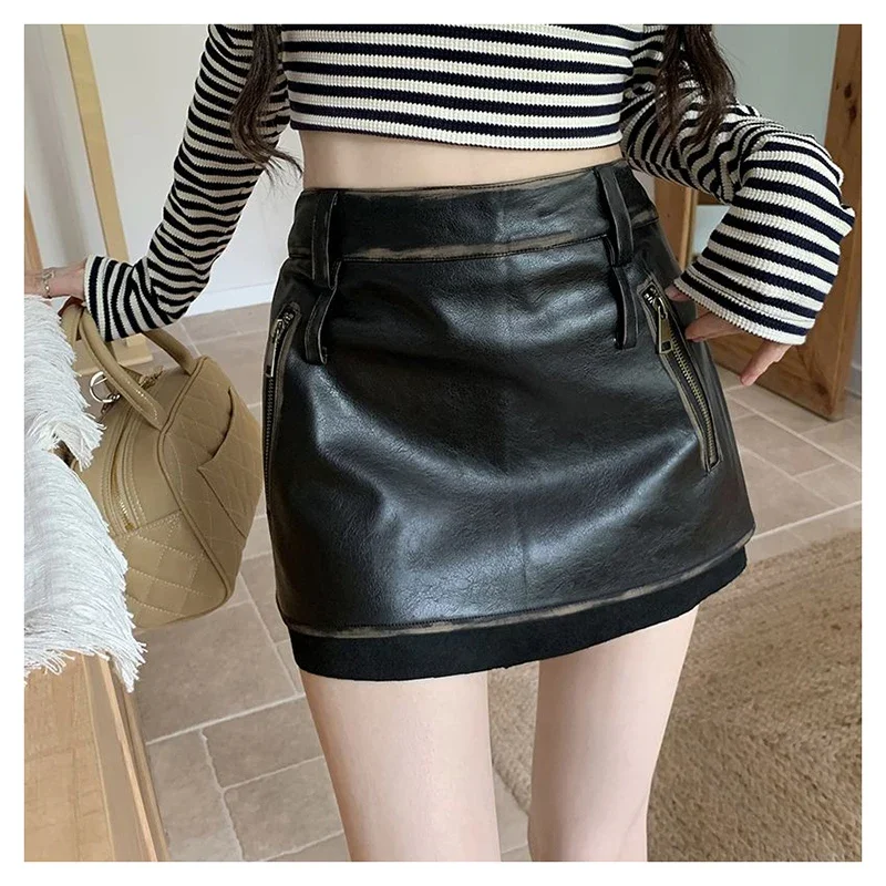 Retro black PU leather skirt, half body  women's autumn and winter  spicy girl skirt, high waist A-line wrapped hip skirt