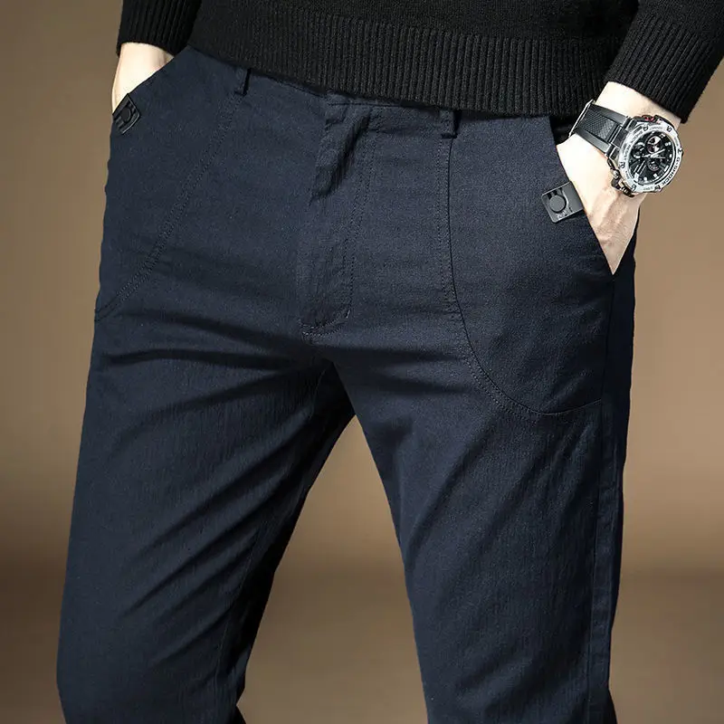 الربيع والخريف الرجال عارضة 2025 جديد كل مباراة السراويل الكورية فضفاضة مستقيمة