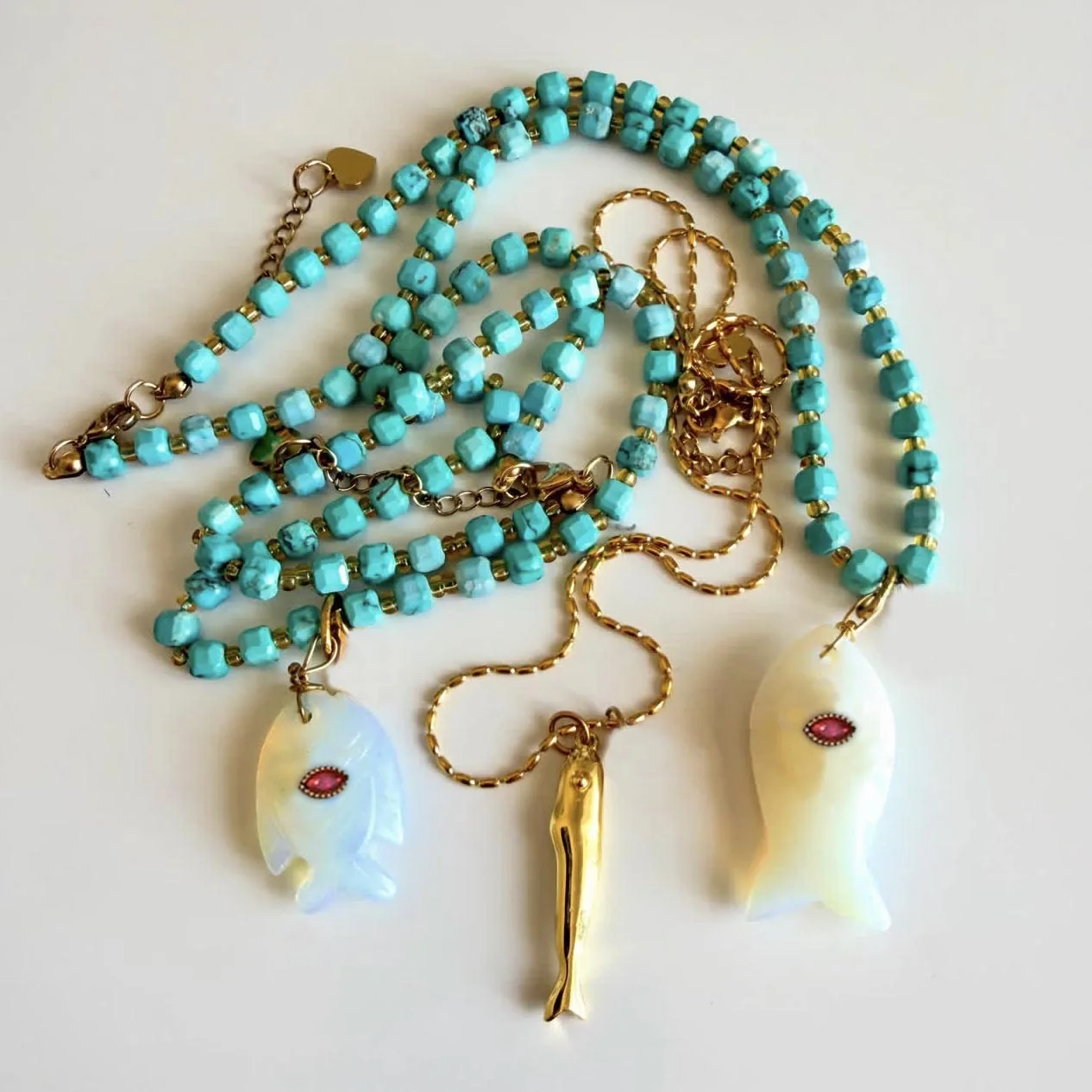 Popular autumn accessories in Europe America include natural jade tree fish pendants, necklaces stainless steel Buddha hands
