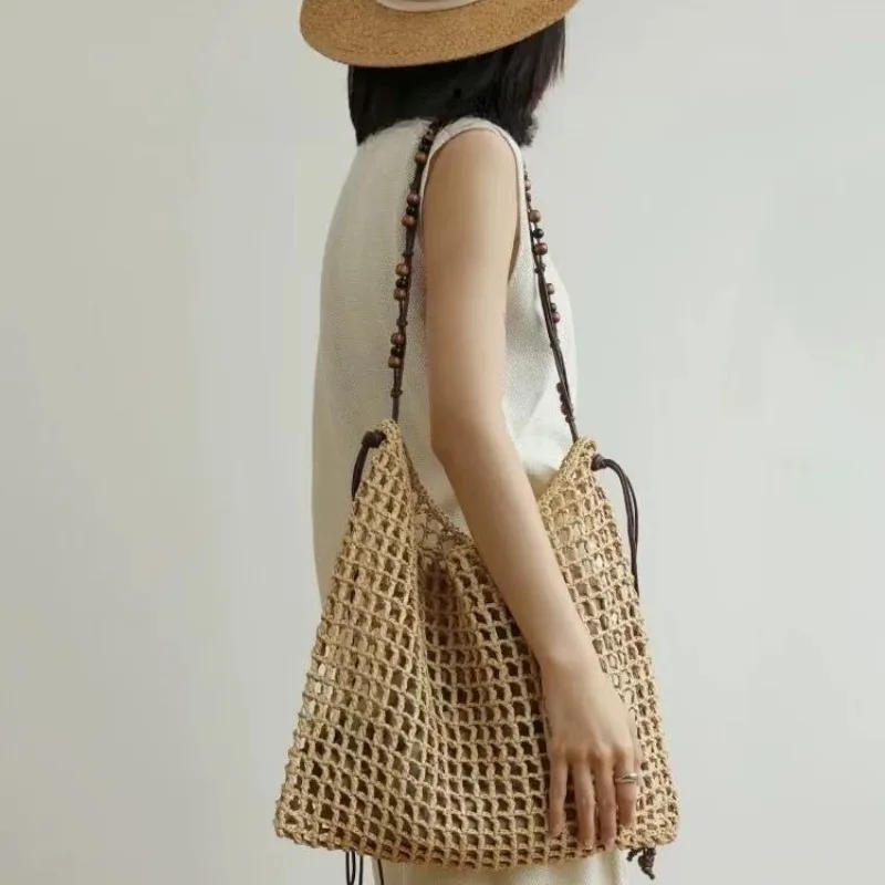 

2025 New fashionable and popular large-capacity straw woven beach bag for women, multi-functional hollowed-out woven storage bag