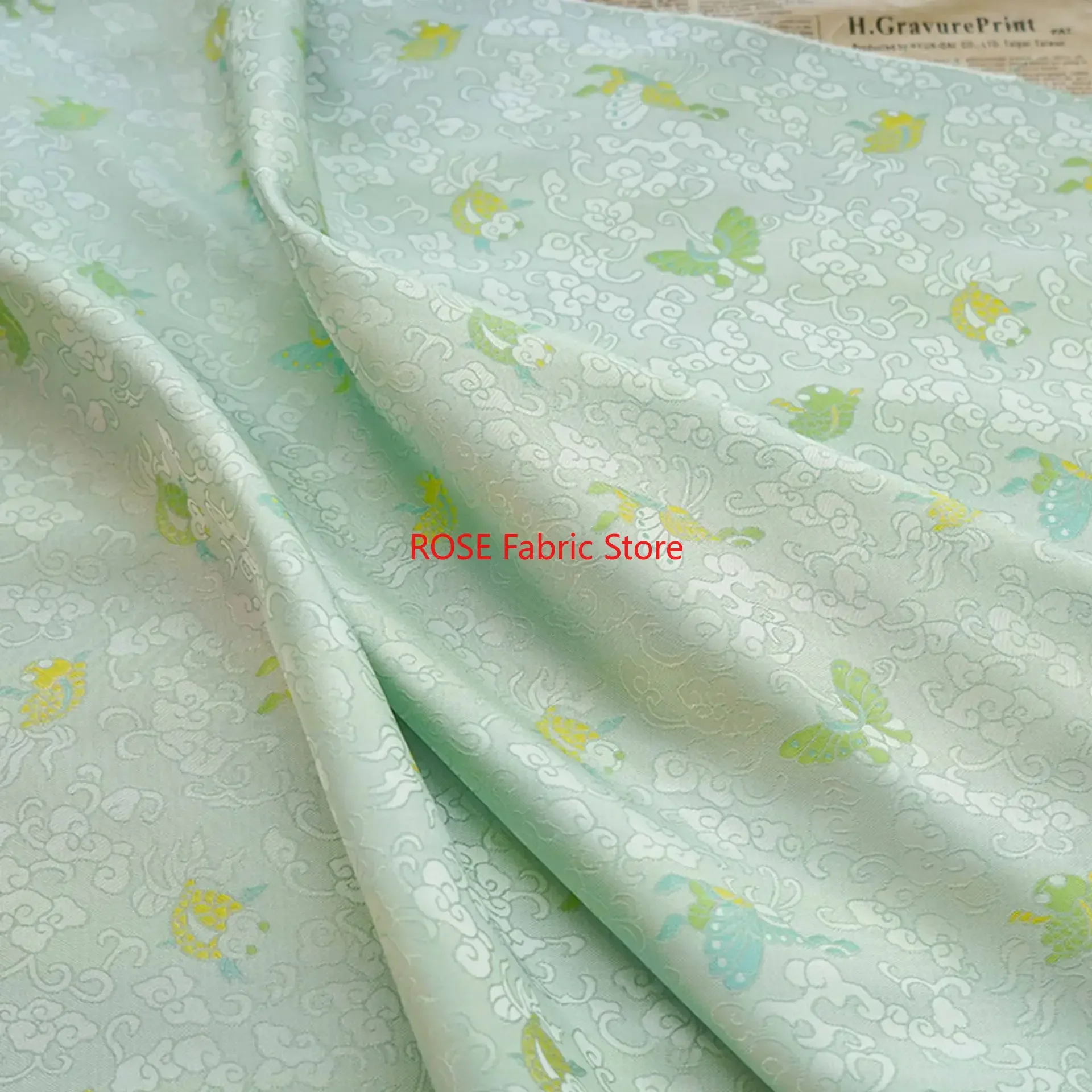

1 meter Fresh Green Butterfly Woven Jacquard Fabric Simple Style Women's Dress Vest Bag Decorative Sewing Fabric