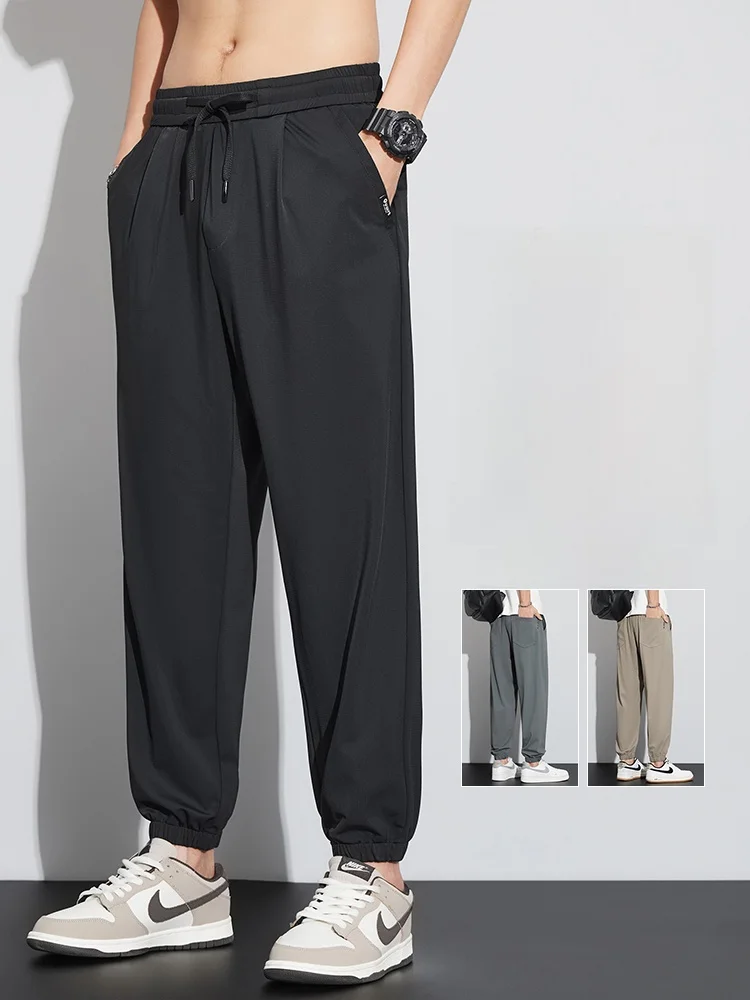 

Мужские летние тонкие высокоэластичные спортивные повседневные брюки из ледяного шелка Qui Dry, свободные универсальные брюки Harlan с девятью точками