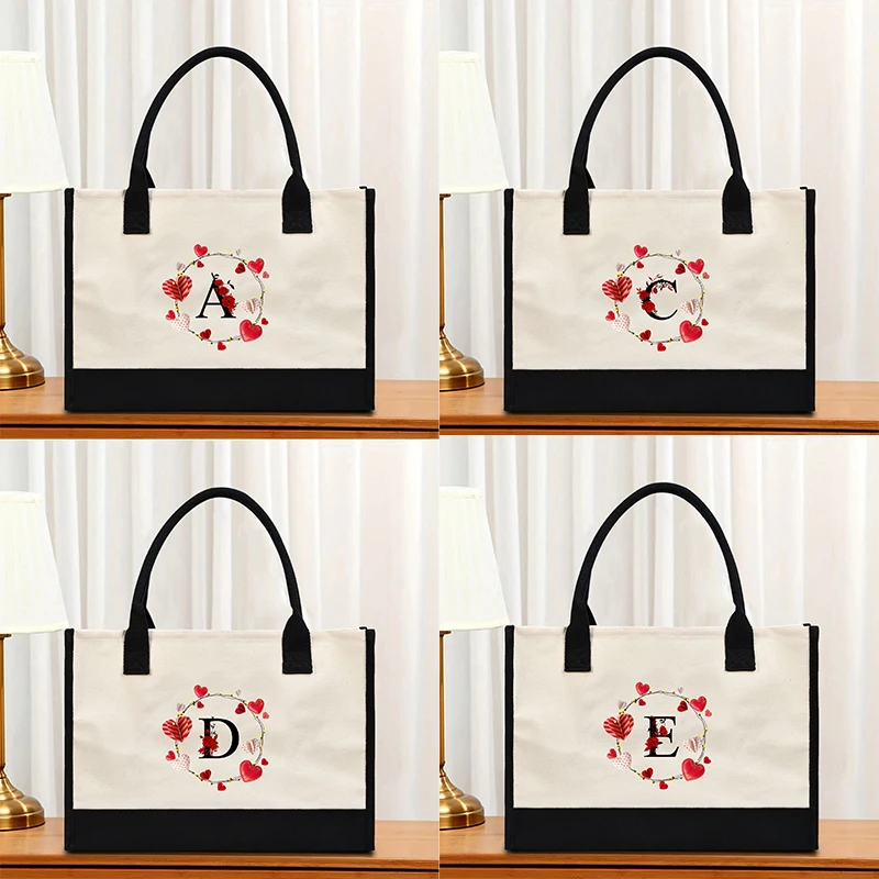 

Love red flower hot stamping letter printed women's handbag, with a large capacity waterproof leisure commuter bag inside