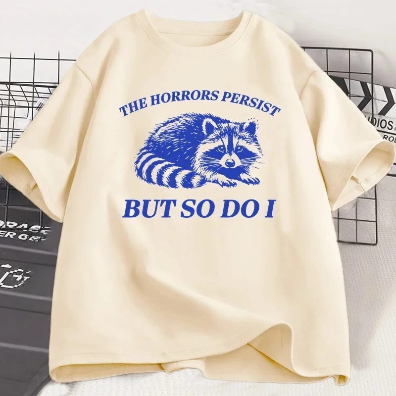 

The Horrors Persist But So Do I T-Shirt Women Funny Raccoon T Shirt Vintage Y2K Animal Humor Tshirt Short Sleeve Tee Graphic Y2K
