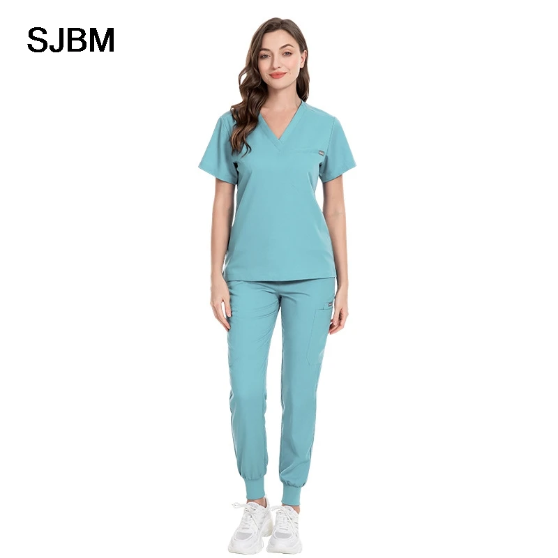 医療用スクラブセット、看護師用スクラブスーツ、病院医師用作業服、多色ジョギングトップパンツ、卸売医療サービススクラブ