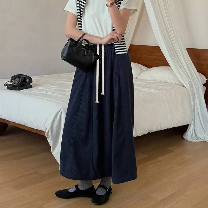 กระโปรงทรงเอ midi ผ้าลูกฟูกสไตล์วินเทจสำหรับผู้หญิง มีกระเป๋า ผูกเชือก ทรงยาว เหมาะสำหรับฤดูใบไม้ร่วงและฤดูหนาว สไตล์เกาหลี หนา