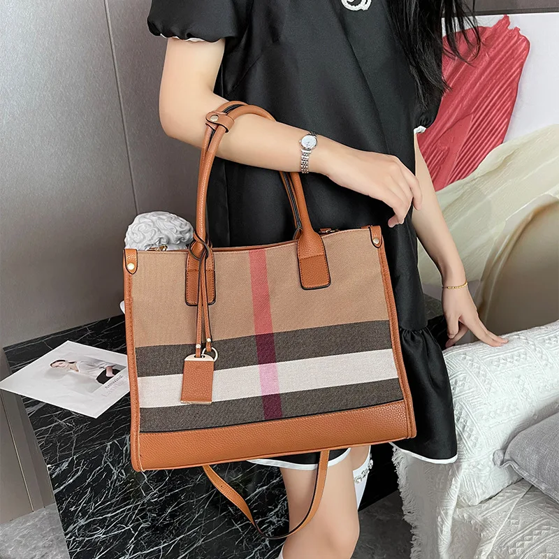 

Color collision light luxury handbag 2026 new women's bag versatile large capacity commuting tote single shoulder crossbody bag