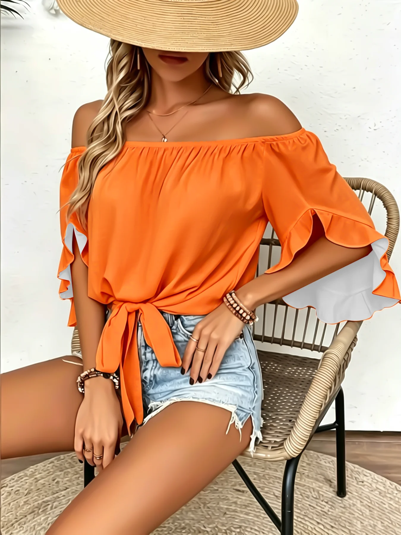 Vacation style off shoulder short sleeved top with flowing lotus leaf sleeves, lightweight women's top